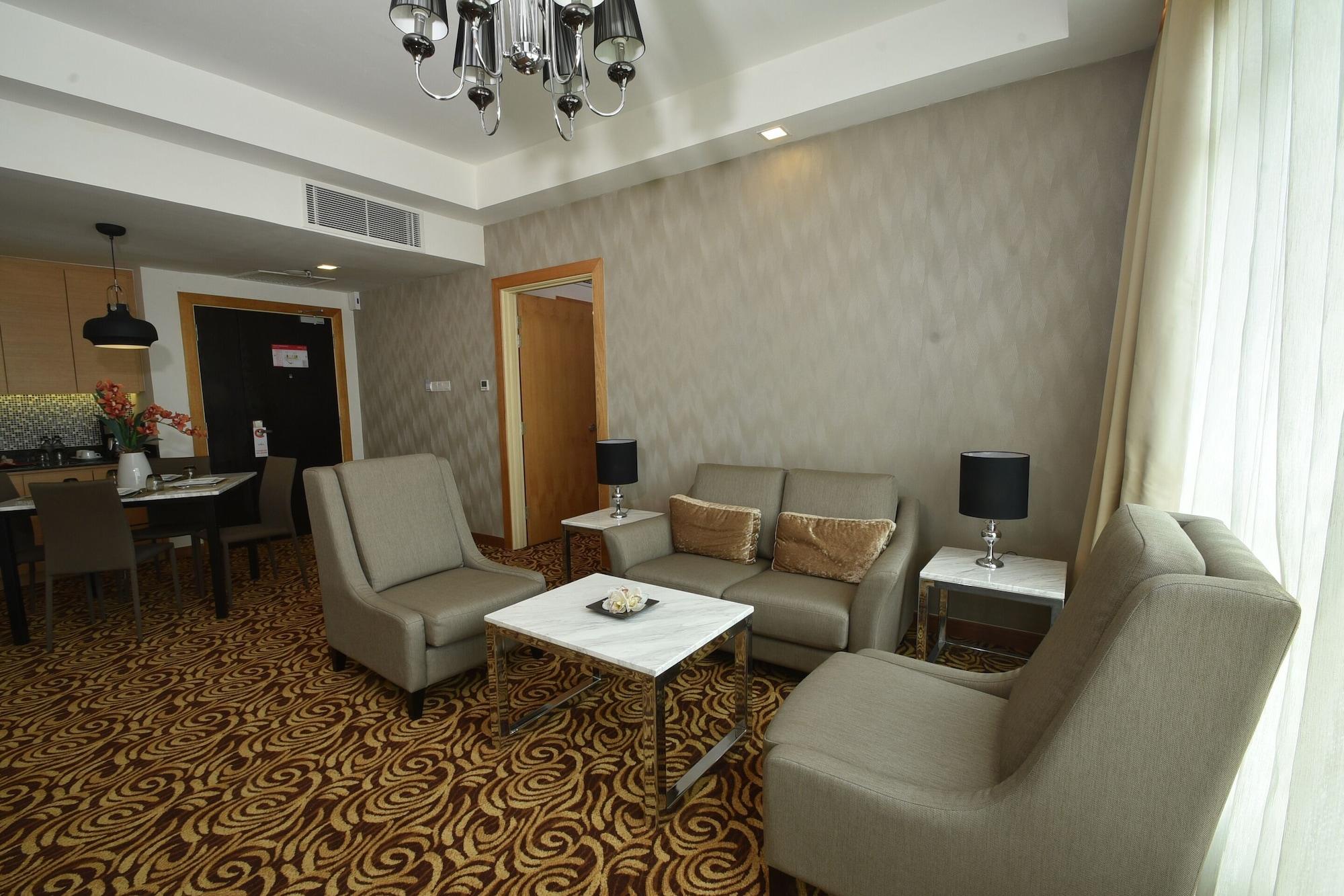 Tenera Hotel Bangi Dış mekan fotoğraf A living room in a suite at the hotel